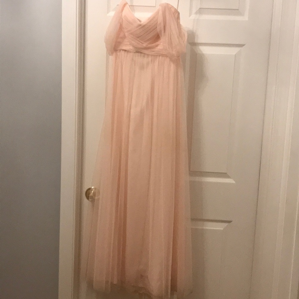Amsale bridesmaid gown, color is Bellini